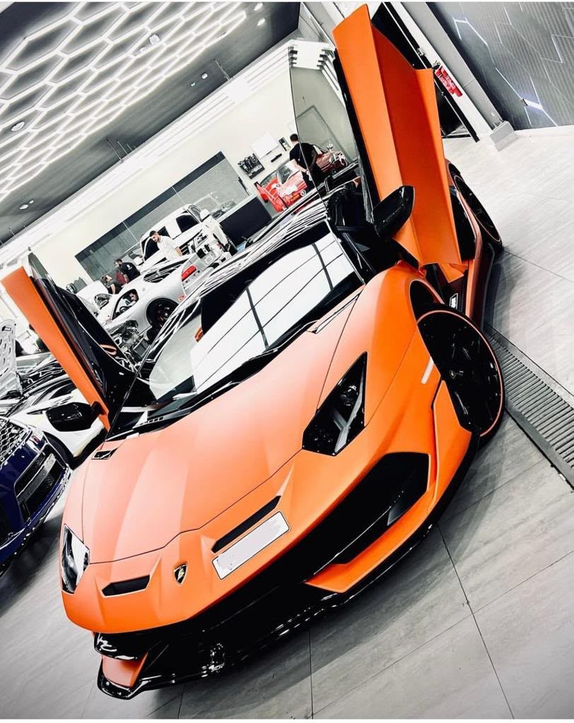 Orange Lamborghini in workshop